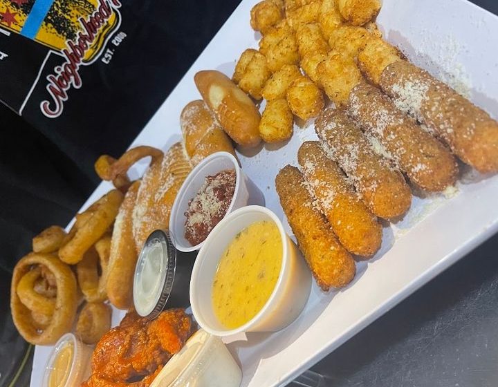 Prepare for a feast with our Ultimate Appetizer Platter! This incredible spread features sauced Cubby Claws, classic Mozzarella Sticks, crispy Onion Rings, spicy Cajun Tater Tots, and savory Parmesan Breadsticks. Served with a delicious assortment of all our dipping sauces. Want the maximum dining experience? Add a batch of our mouthwatering Wings