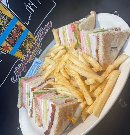 Indulge in our classic club sandwich featuring premium ham, succulent turkey, and sizzling bacon. Topped with crisp lettuce, juicy tomato, and your favorite cheese, served on toasted bread cut into quarters. It's a satisfying bite every time! Served on white or rye toast.