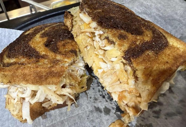 A delightful twist on a deli favorite! Tender deli-sliced turkey breast, tangy 1000 Island dressing, savory sauerkraut, and melted Swiss cheese, all grilled on crisp rye toast. It's a perfect harmony of flavors!