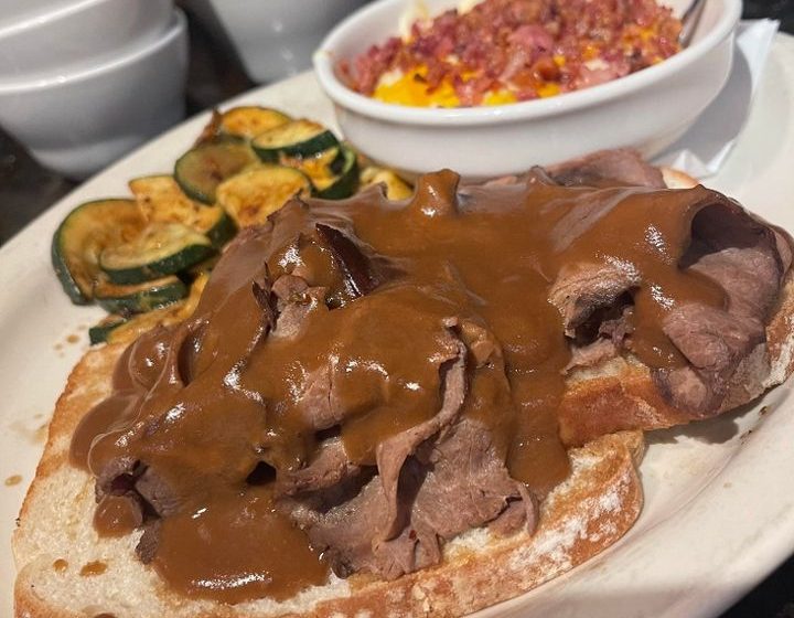 Experience true Southern comfort! Our tender, deli-sliced roast beef is generously topped with our savory, homemade brown gravy and served on warm, open-faced white bread. A perfectly satisfying meal, accompanied by two regular side items. Feeling extra fancy? Add mushrooms for an additional $.99!