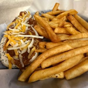 Our Chili Cheese dog with Vienna All Beef Hot Dog With Natural Casing Topped With Chili And Shredded Cheddar Cheese On A Vienna Poppyseed Bun.