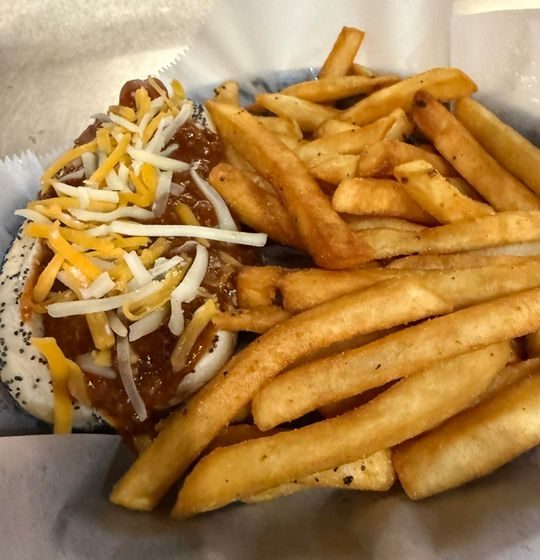Our Chili Cheese dog with Vienna All Beef Hot Dog With Natural Casing Topped With Chili And Shredded Cheddar Cheese On A Vienna Poppyseed Bun.