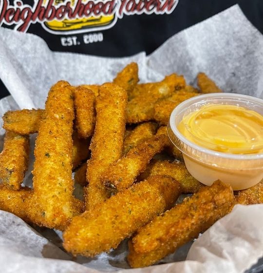 Discover your new favorite appetizer! Tender zucchini fries, coated in a delicate batter and fried to a golden crunch. Each bite is perfectly complemented by our unique, creamy homemade Cajun ranch dipping sauce
