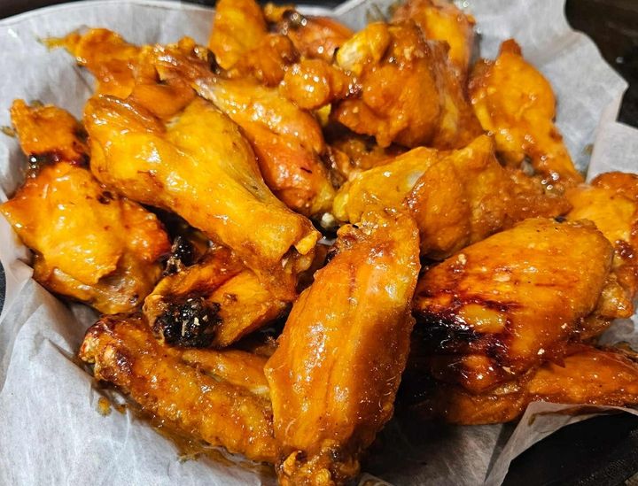 Get ready for the best wings around! Our jumbo wings are always fresh, never frozen, and cooked to crispy perfection. Choose your favorite sauce (feel free to mix flavors, Wings can also be split 1/2 & 1/2 with a 20 piece order. Every order comes with one dipping sauce. Craving more? Celery and extra sauces/dressings are available for a small additional charge.