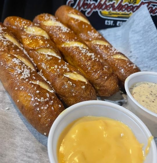 Get your hands on four jumbo pretzel sticks, generously seasoned with pretzel salt and baked to perfection. Accompanied by velvety beer cheese and our unique ground brewpub mustard for a truly satisfying bite